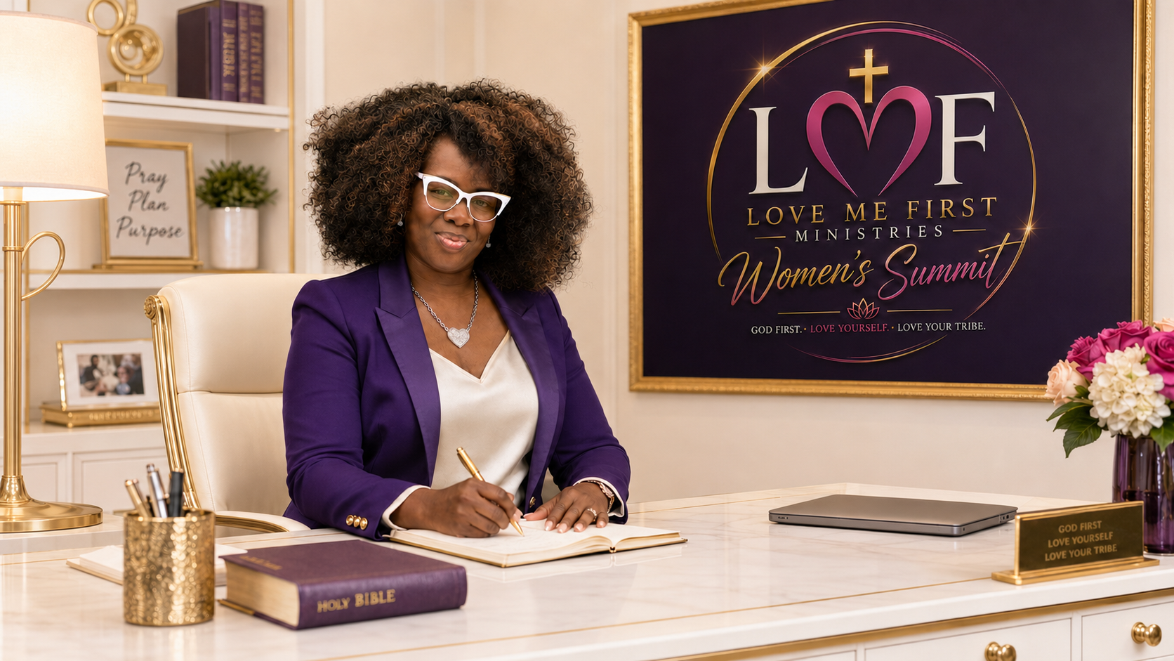 Founder of Love Me First Ministries writing at her desk beneath the LMF Women's Summit logo